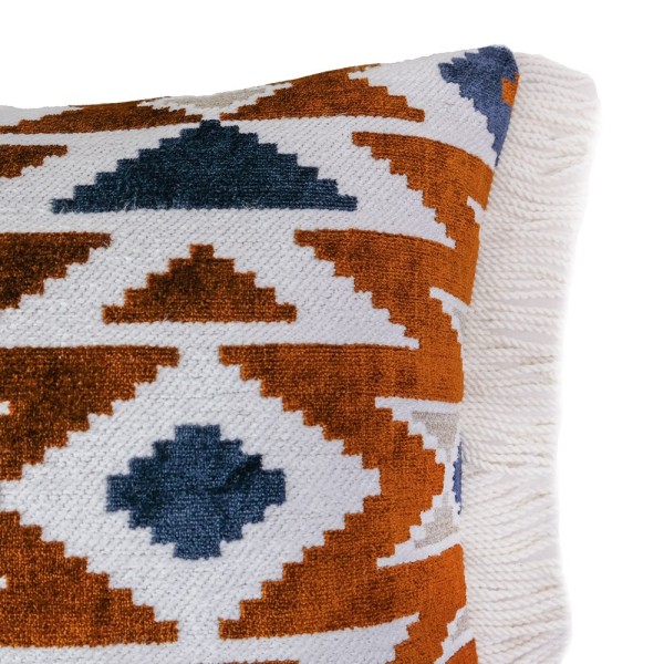 Cojín geométrico bordado con flecos rizados | Tapidecor